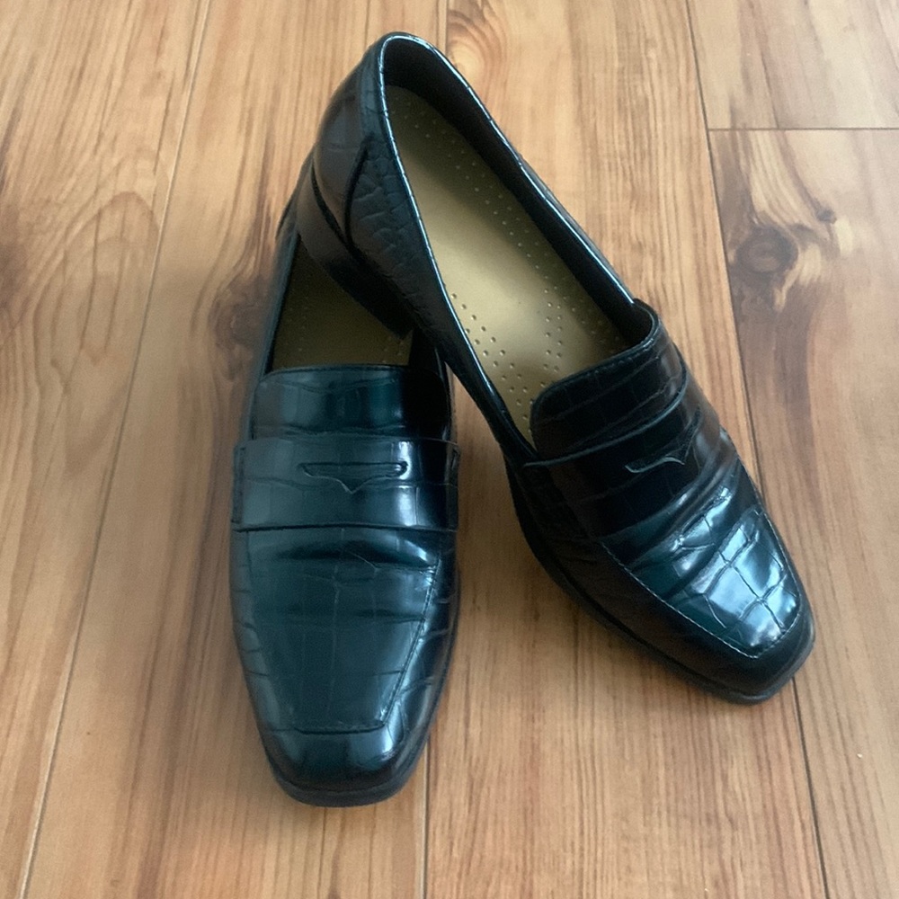 Black, snake skin loafers.